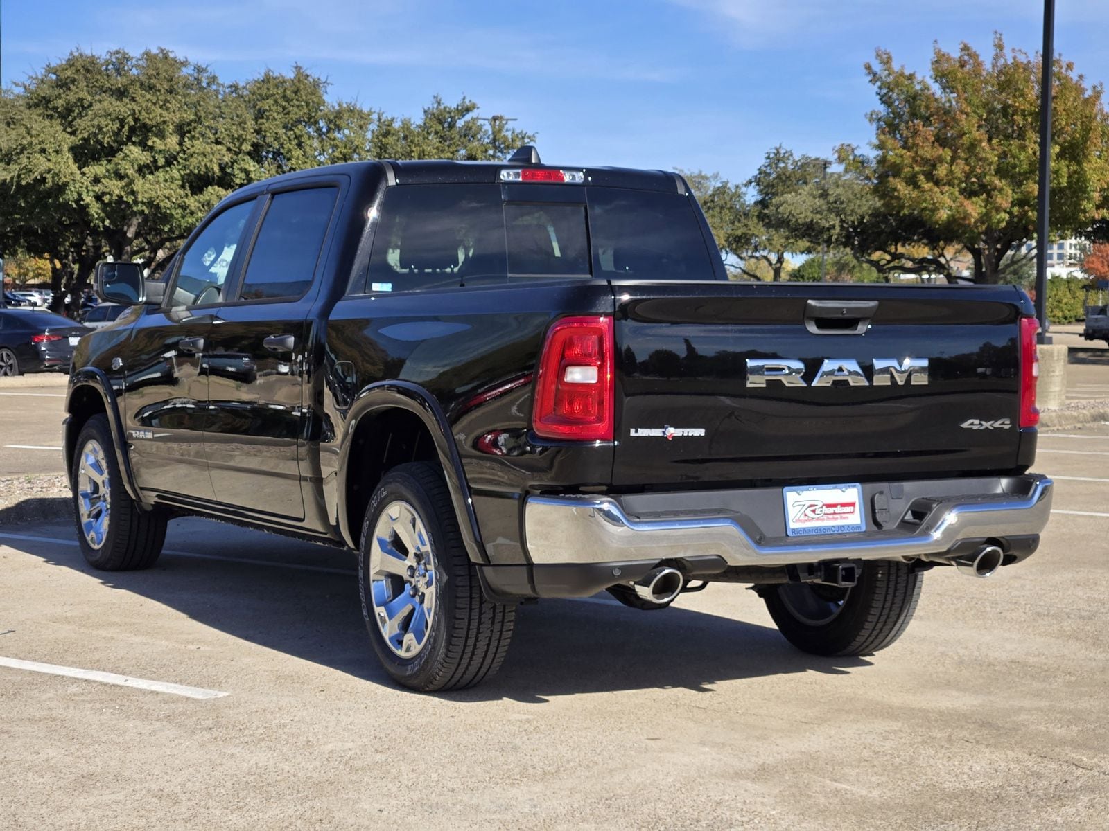 New 2026 Diamond Black Crystal Pearlcoat Ram LONE STAR CREW CAB 4X4 5