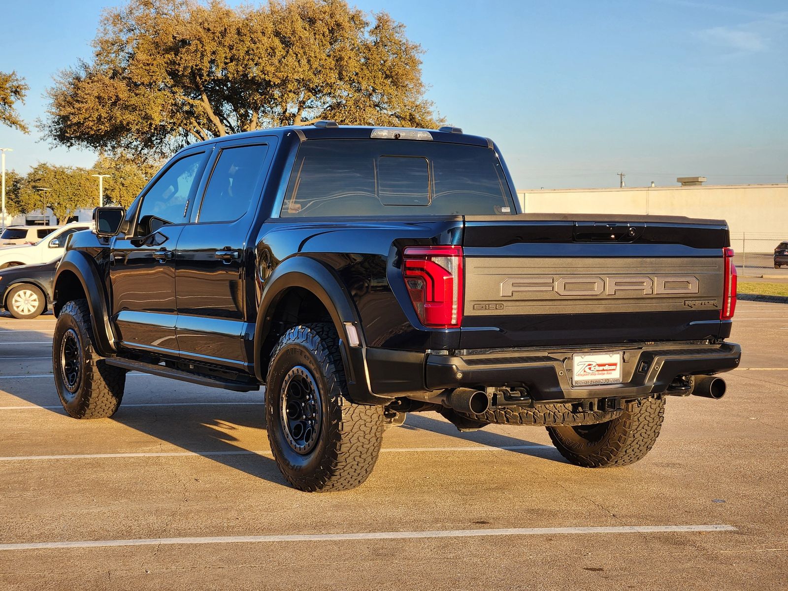 Used 2024 Antimatter Blue Ford Raptor image 4
