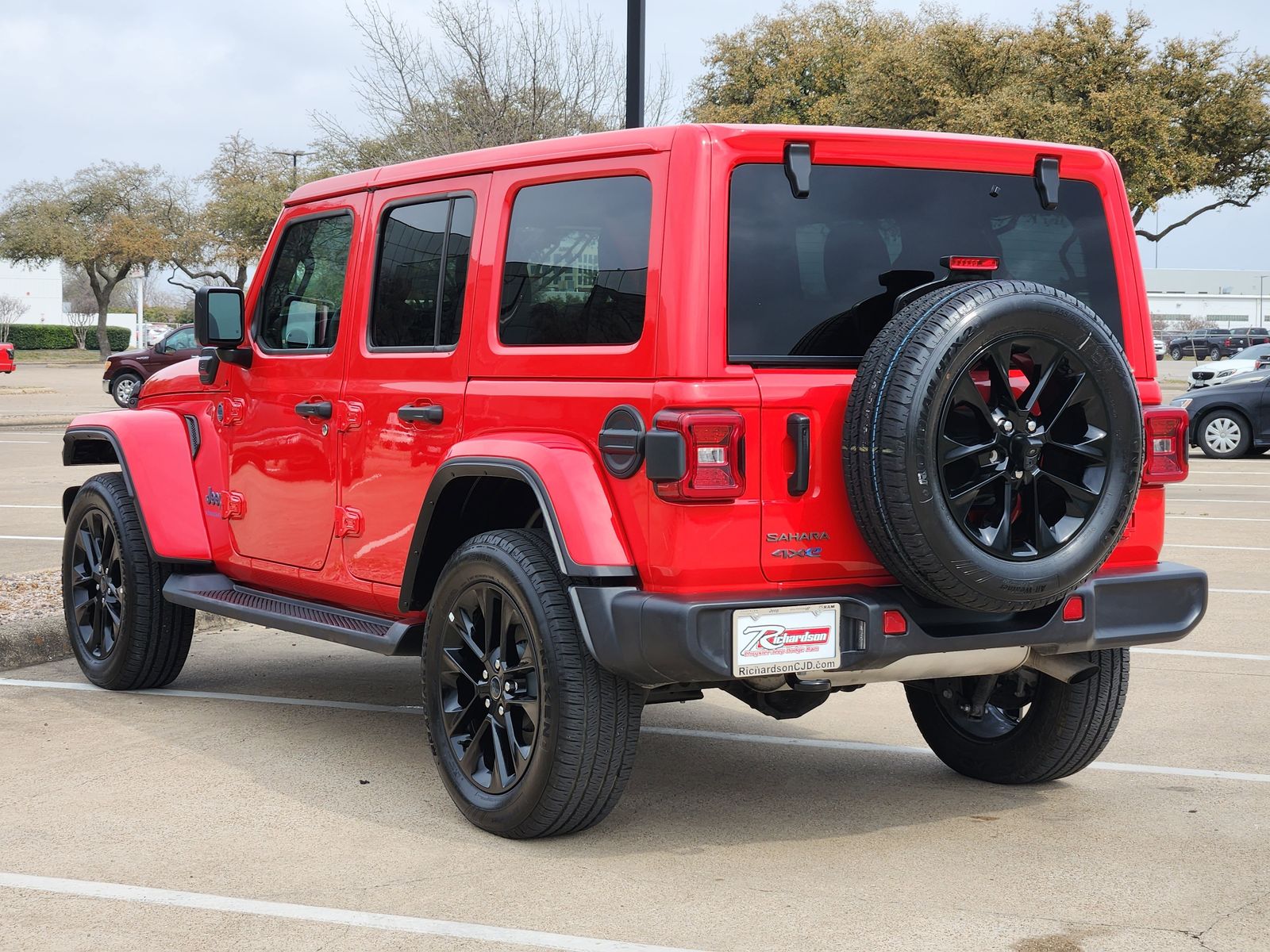 Certified Used 2025 Firecracker Red Jeep Sahara image 4