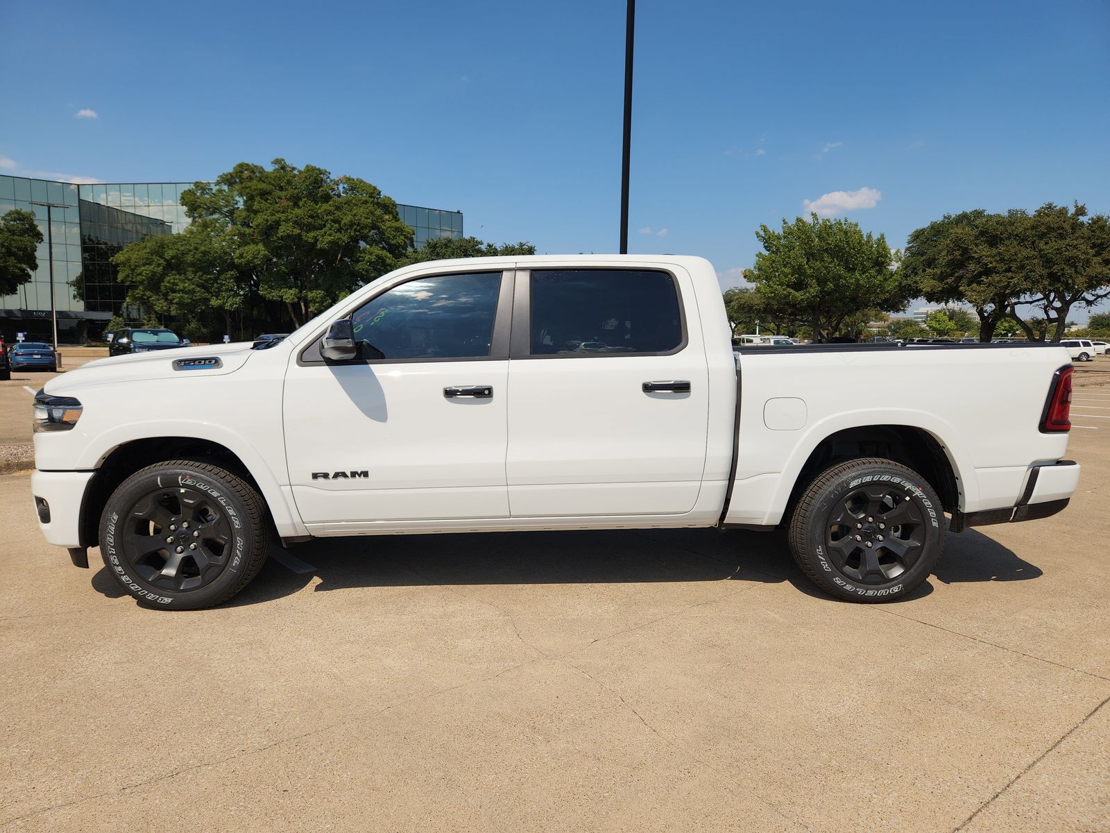 New 2026 Bright White Ram LONE STAR CREW CAB 4X2 5