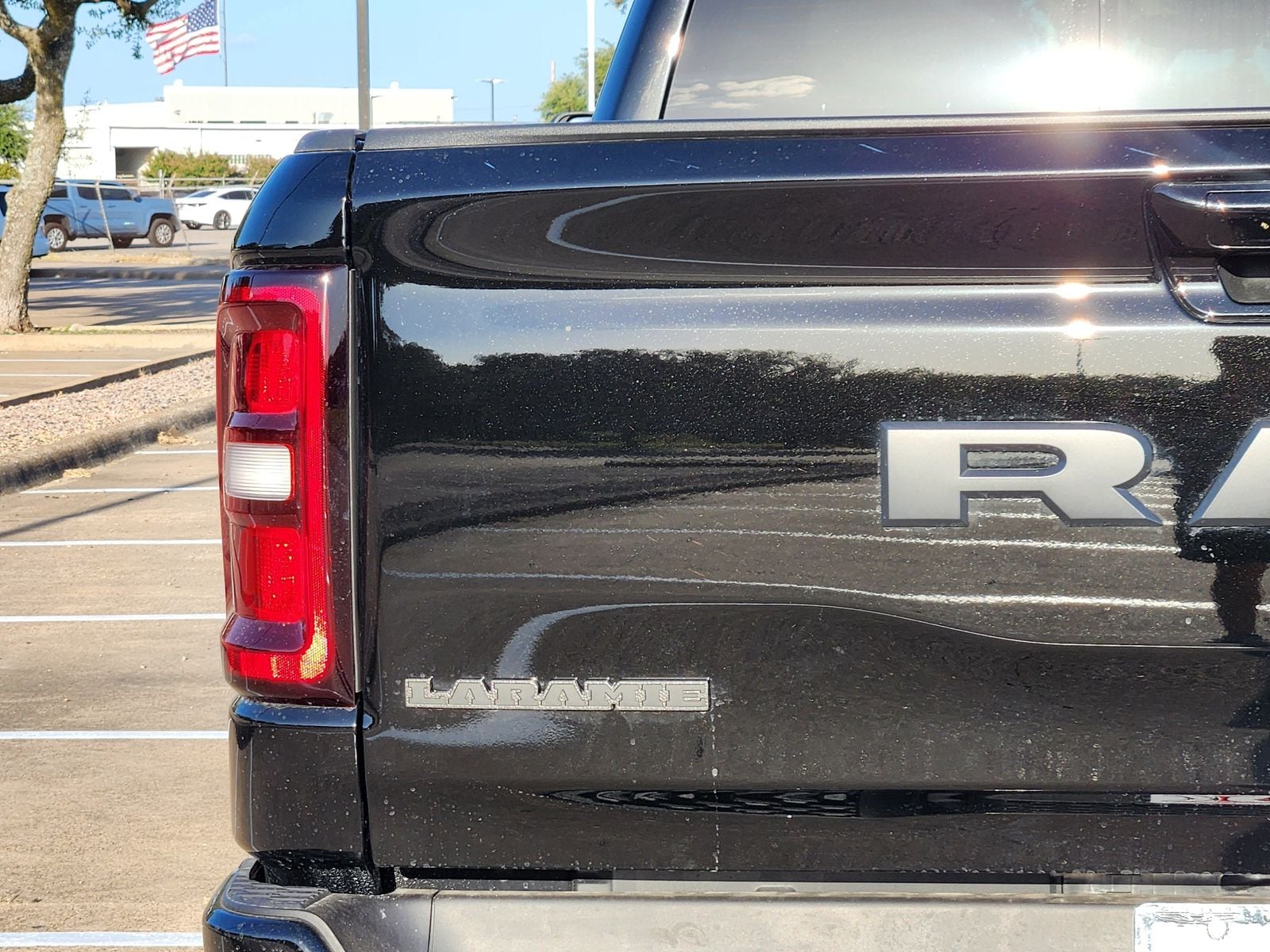 New 2026 Diamond Black Crystal Pearlcoat Ram LARAMIE CREW CAB 4X4 5
