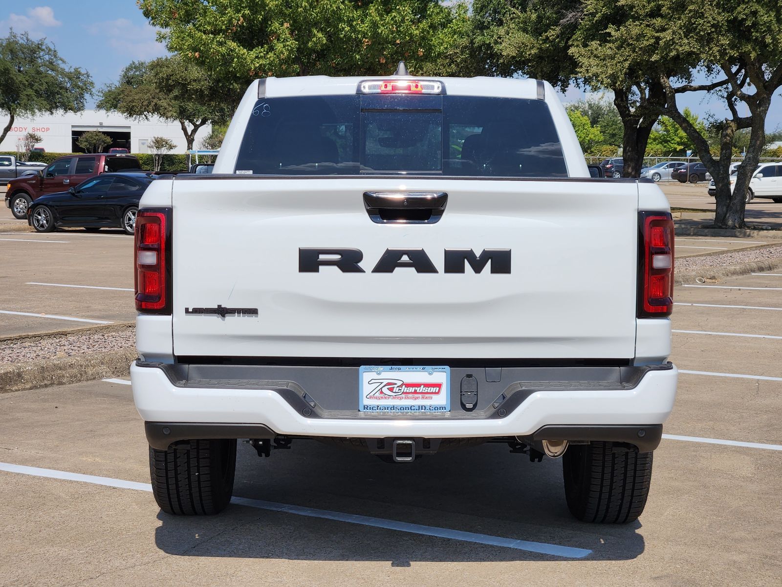 New 2026 Bright White Ram LONE STAR CREW CAB 4X2 5