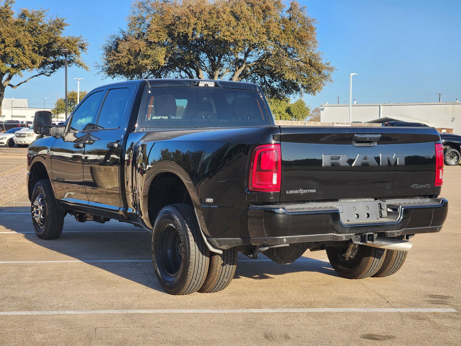 New 2026 Diamond Black Crystal Pearlcoat Ram LONE STAR CREW CAB 4X4 8