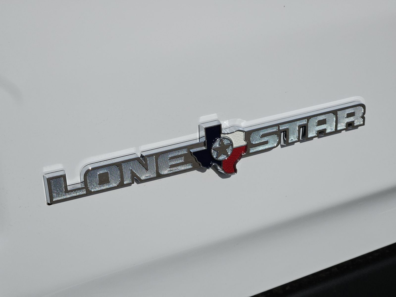 New 2026 Bright White Ram LONE STAR CREW CAB 4X4 5