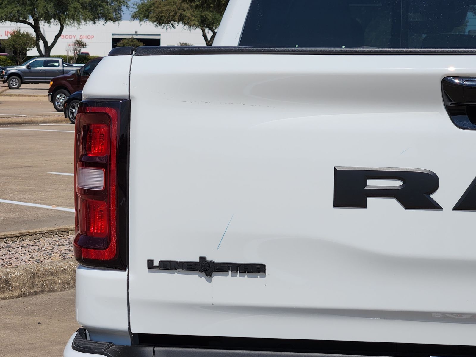 New 2026 Bright White Ram LONE STAR CREW CAB 4X2 5