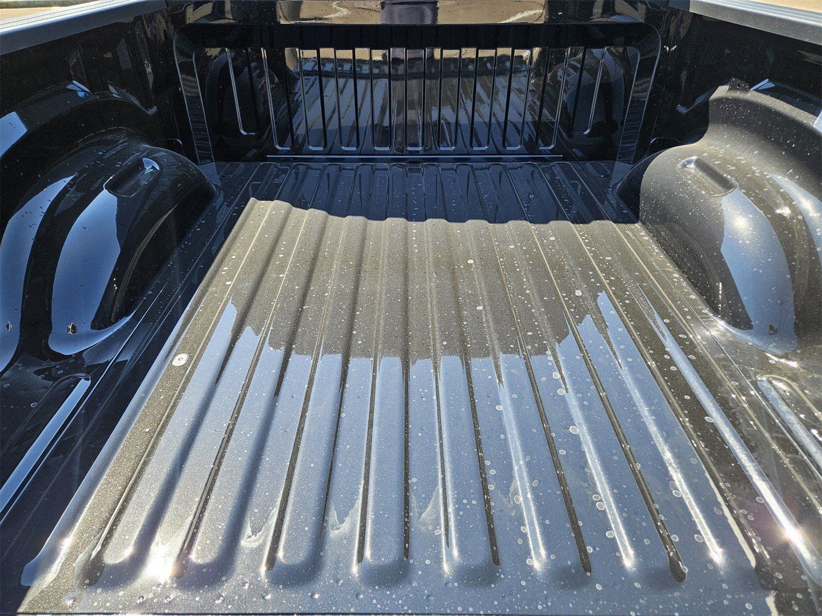 New 2026 Diamond Black Crystal Pearlcoat Ram LONE STAR CREW CAB 4X4 5