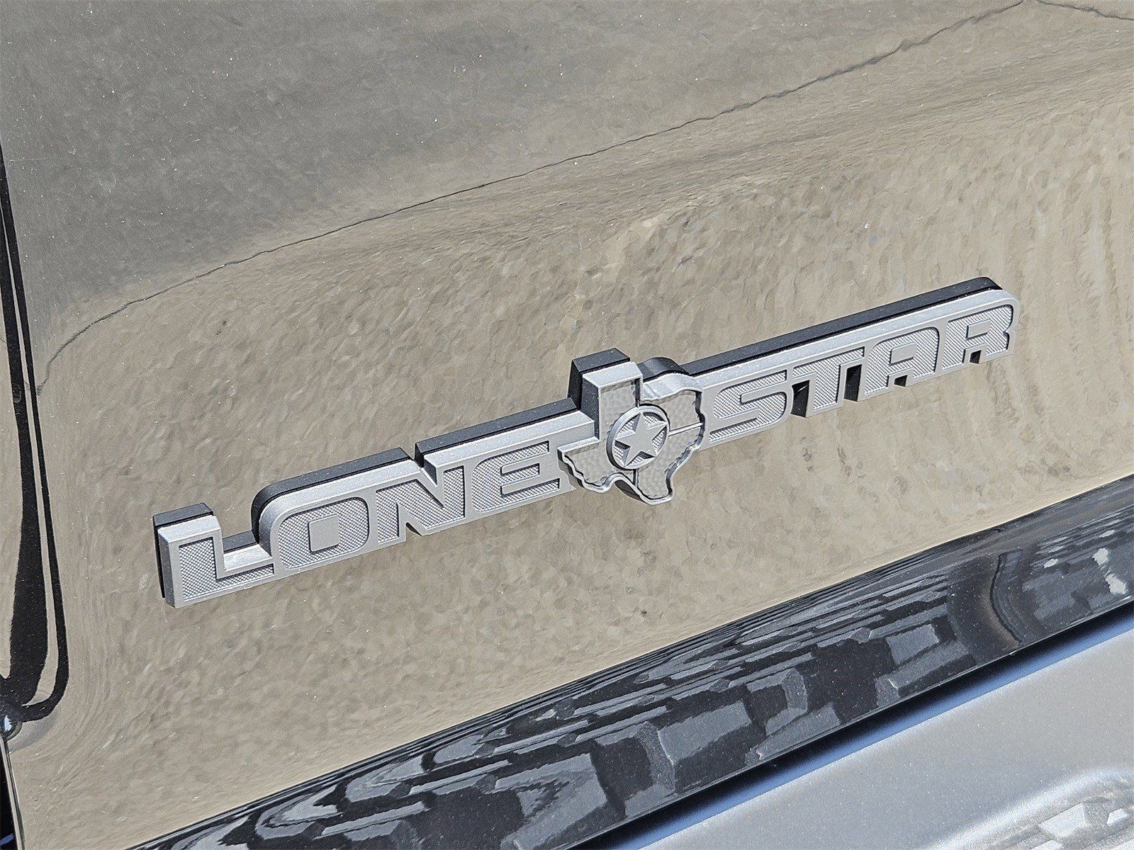 New 2026 Diamond Black Crystal Pearlcoat Ram LONE STAR CREW CAB 4X4 5