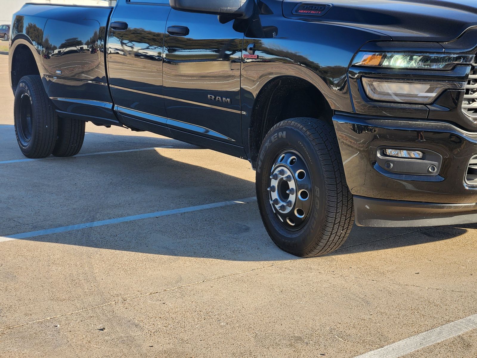 New 2026 Diamond Black Crystal Pearlcoat Ram LONE STAR CREW CAB 4X4 8