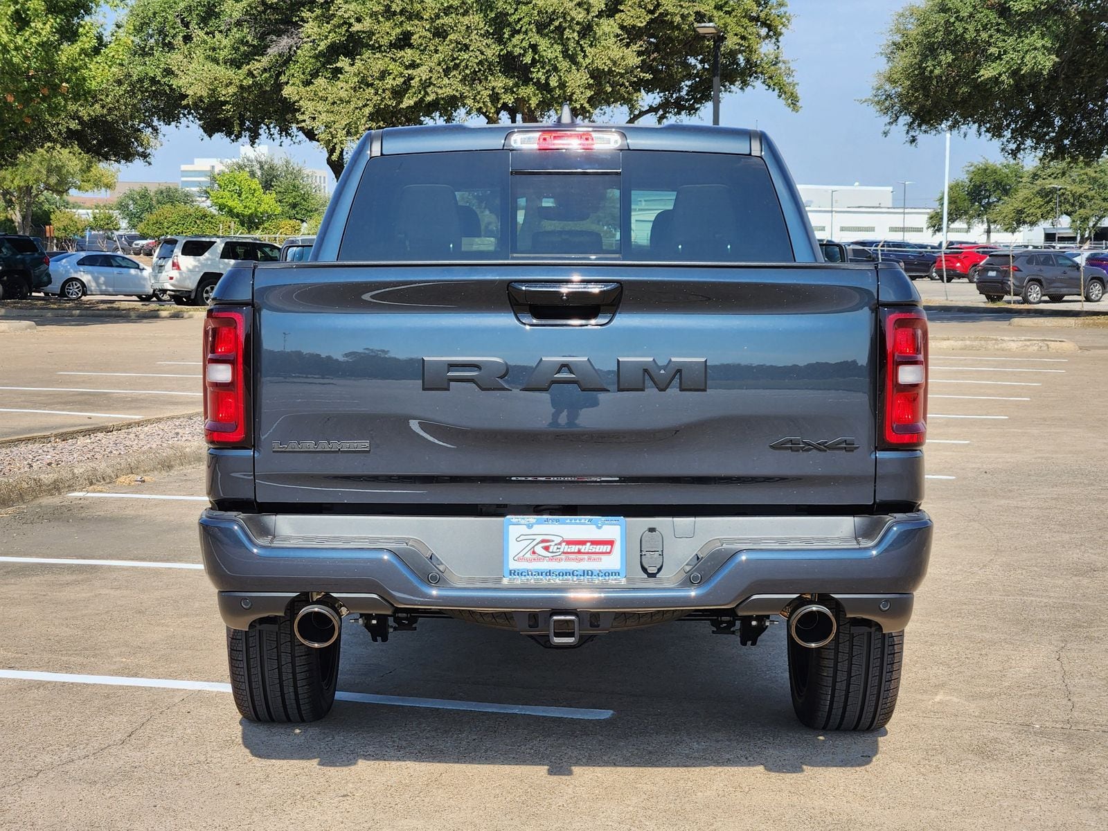 New 2026 Forged Blue Ram LARAMIE CREW CAB 4X4 5