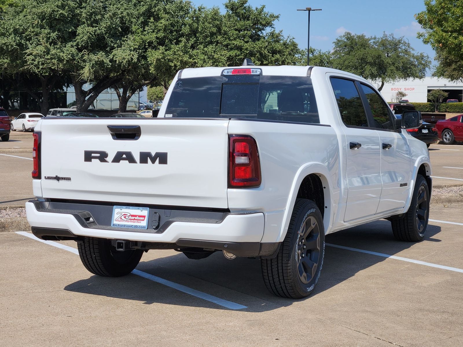 New 2026 Bright White Ram LONE STAR CREW CAB 4X2 5