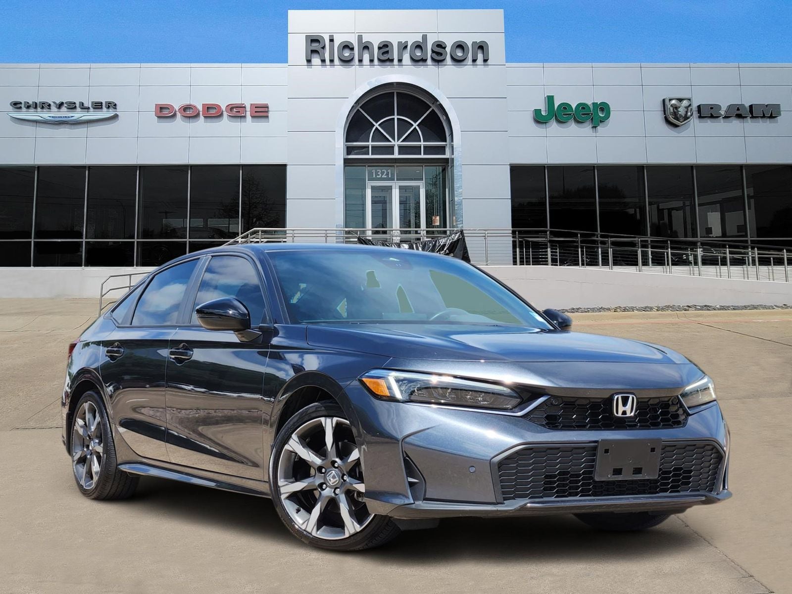 2025 Honda Civic Sport Touring Hybrid CVT's photo