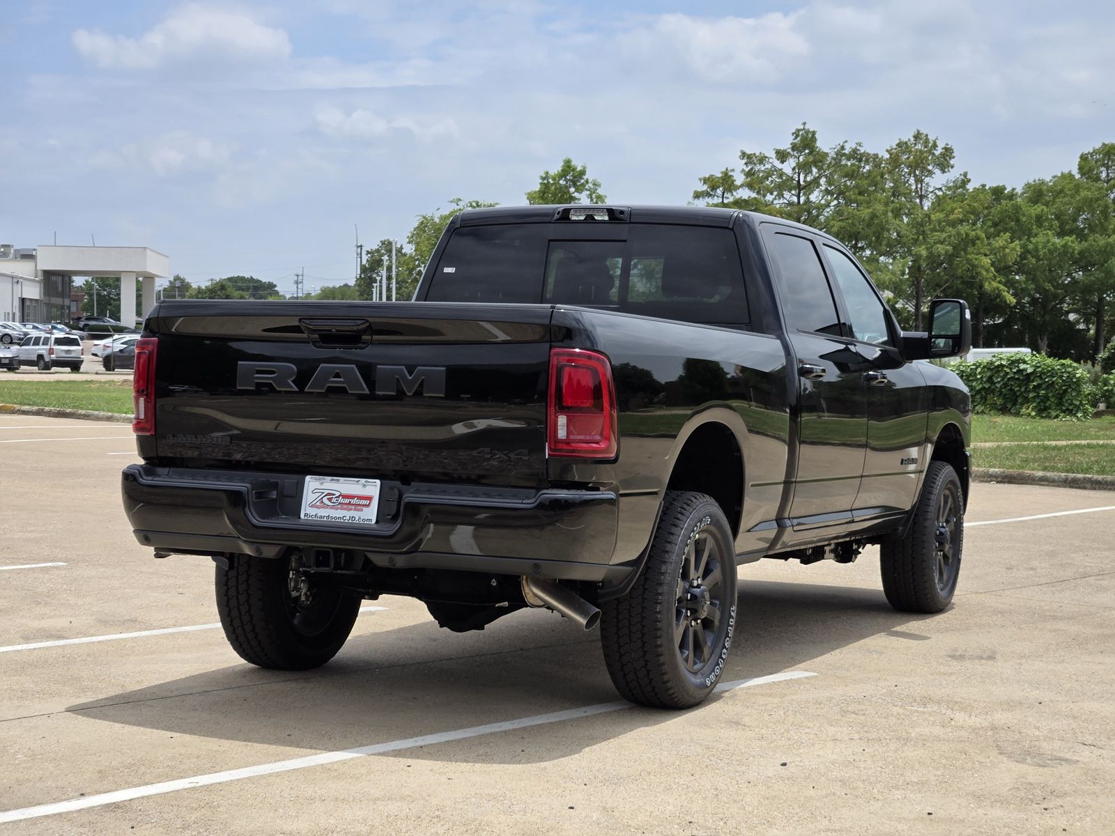 New 2026 Diamond Black Crystal Pearlcoat Ram LARAMIE CREW CAB 4X4 6