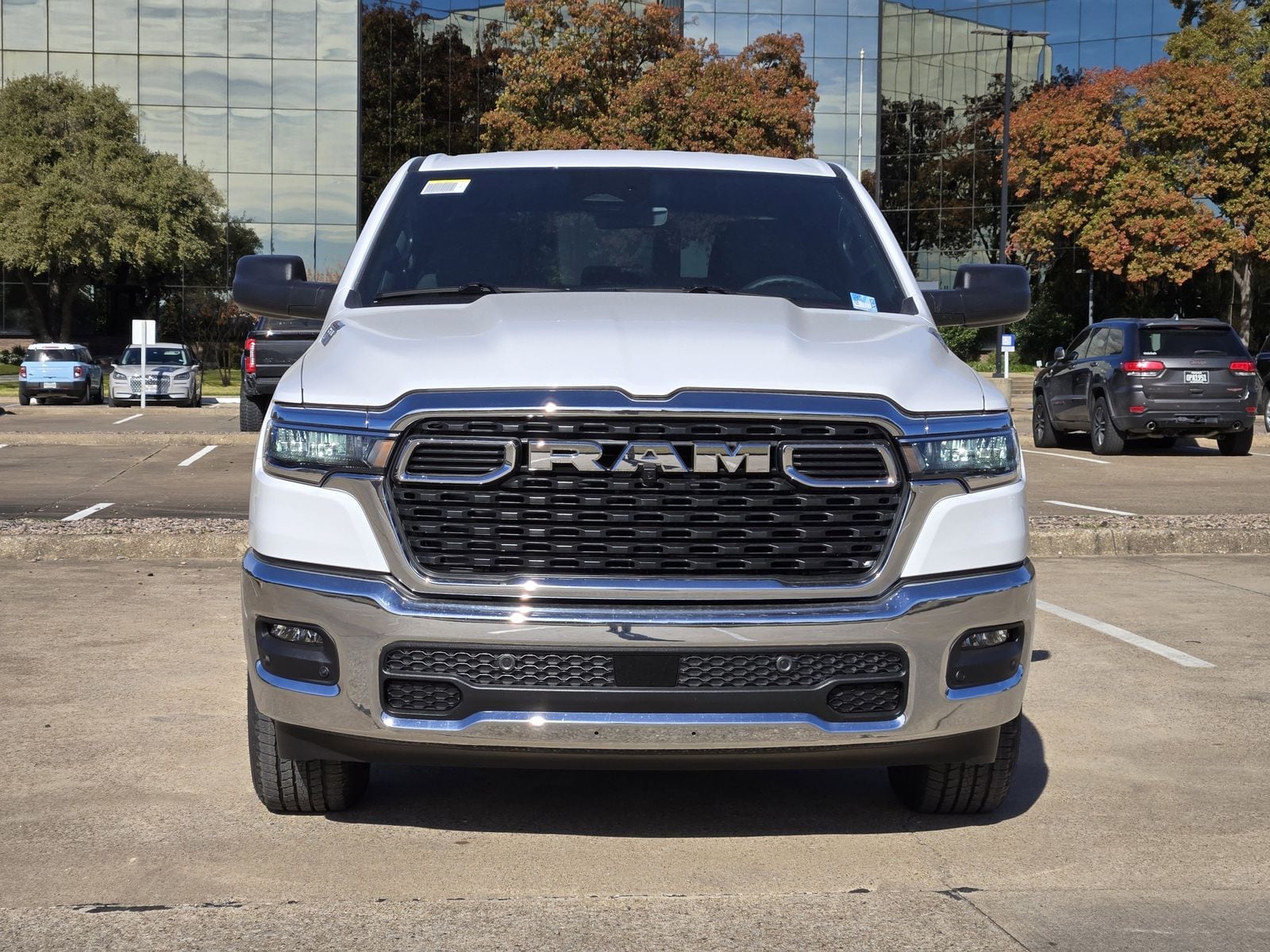 New 2026 Bright White Ram LONE STAR CREW CAB 4X4 5