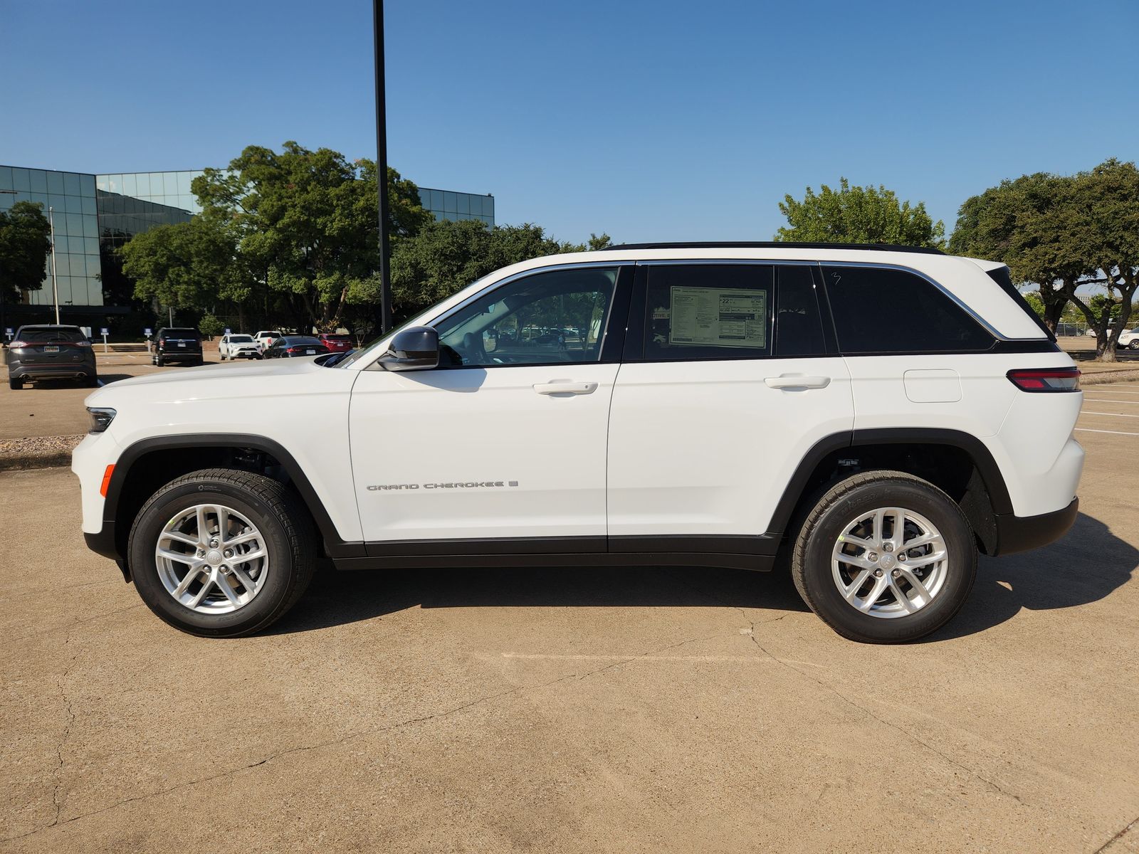 New 2026 Bright White Jeep LAREDO 4X4 image 3