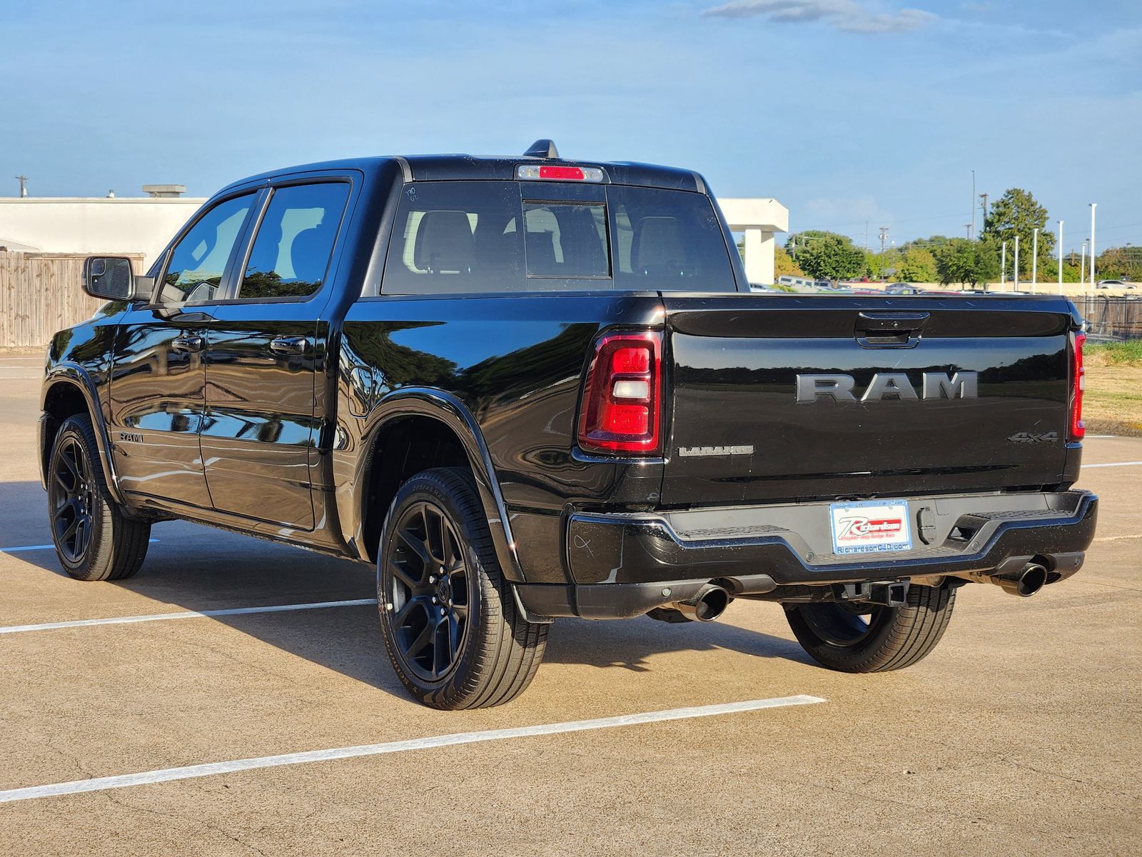 New 2026 Diamond Black Crystal Pearlcoat Ram LARAMIE CREW CAB 4X4 5