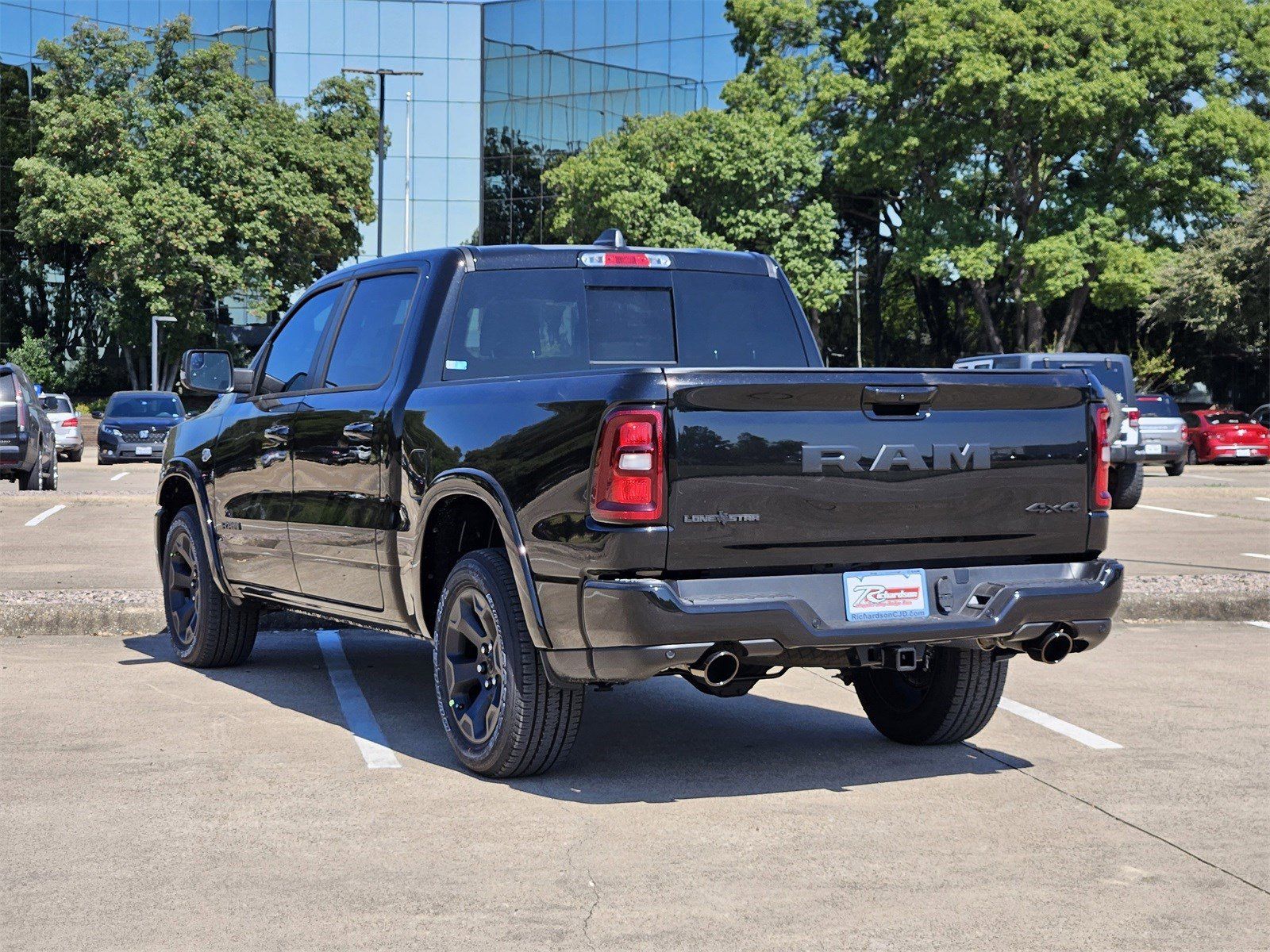 New 2026 Diamond Black Crystal Pearlcoat Ram LONE STAR CREW CAB 4X4 5