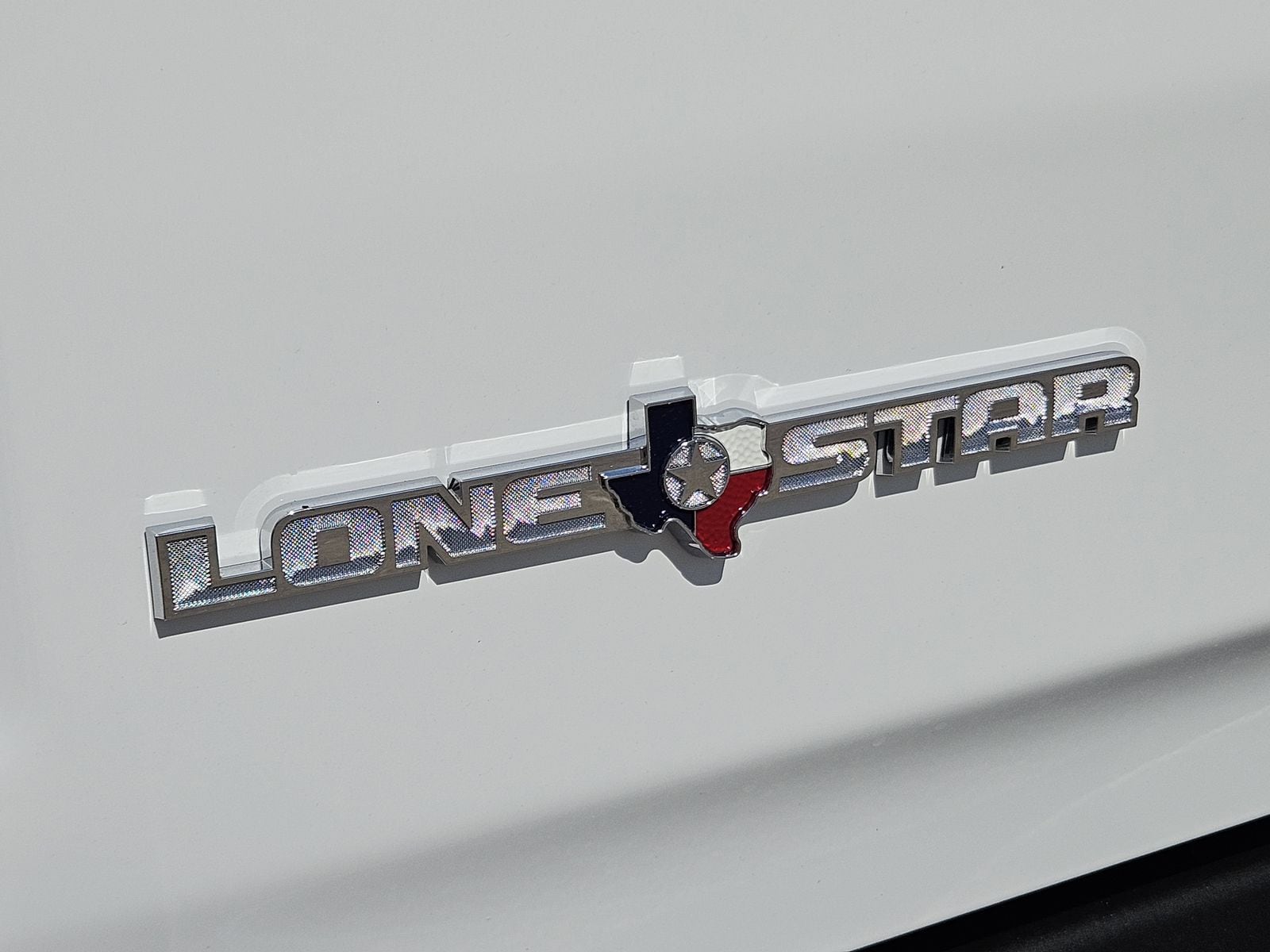 New 2026 Bright White Ram LONE STAR CREW CAB 4X4 5
