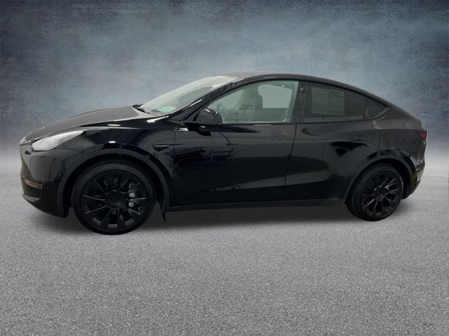 Used 2023 Tesla Model Y Long Range with VIN 7SAYGDEE7PF608154 for sale in Dubuque, IA