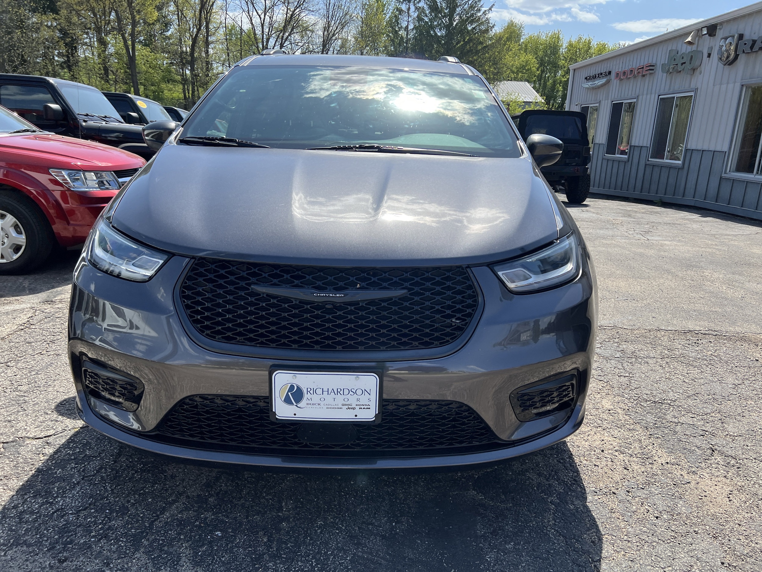View vehicle photo 3