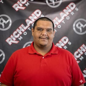 Staff member Carlos Rodriguez from ID_ff4b3c