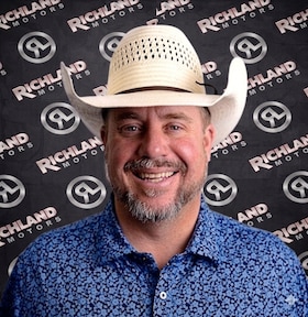 Staff member Travis Hicks from ID_75f98137e524