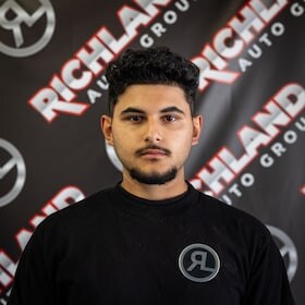 Staff member Israel Huerta from ID_123deb