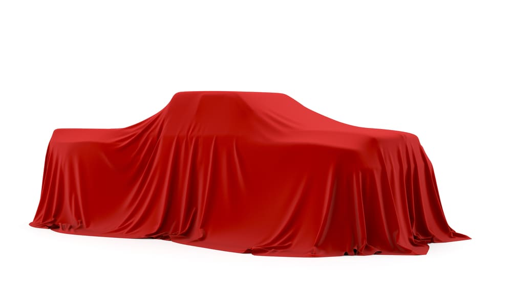 Truck under a red cloth