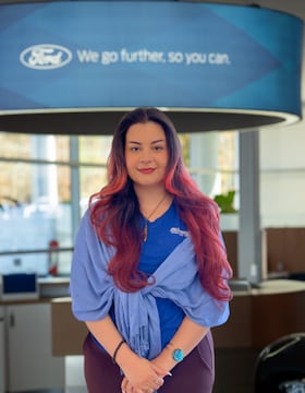 Staff member Genesis Ortiz from ID_8782456c84b0