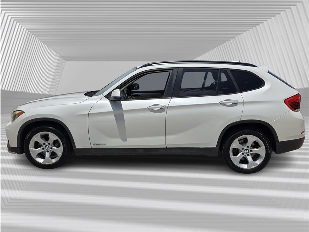 Used 2015 BMW X1 28i with VIN WBAVM1C53FV498615 for sale in Davie, FL