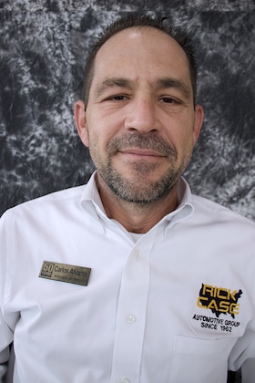 Staff member Carlos Alvarez from 9299b50e6736