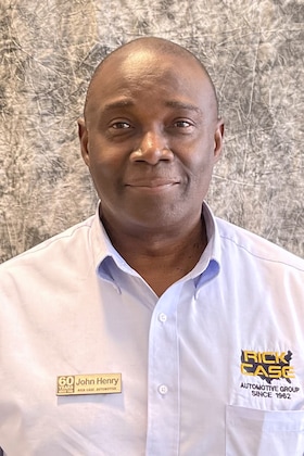 Staff member John Henry from 19239c7aad48