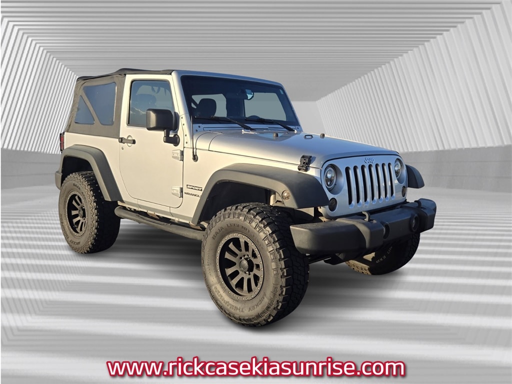 Used 2012 Jeep Wrangler Sport with VIN 1C4AJWAG2CL251797 for sale in Sunrise, FL