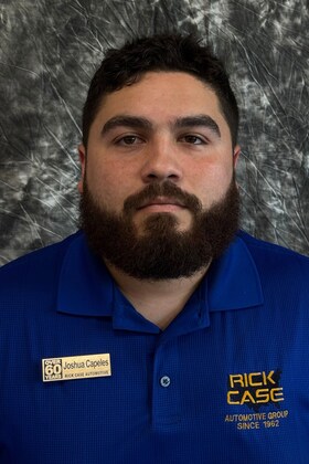 Staff member Joshua Capeles from 57ee1634f98c