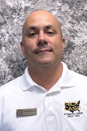 Staff member Charlie Maldonado from 6a6b8dc75d46