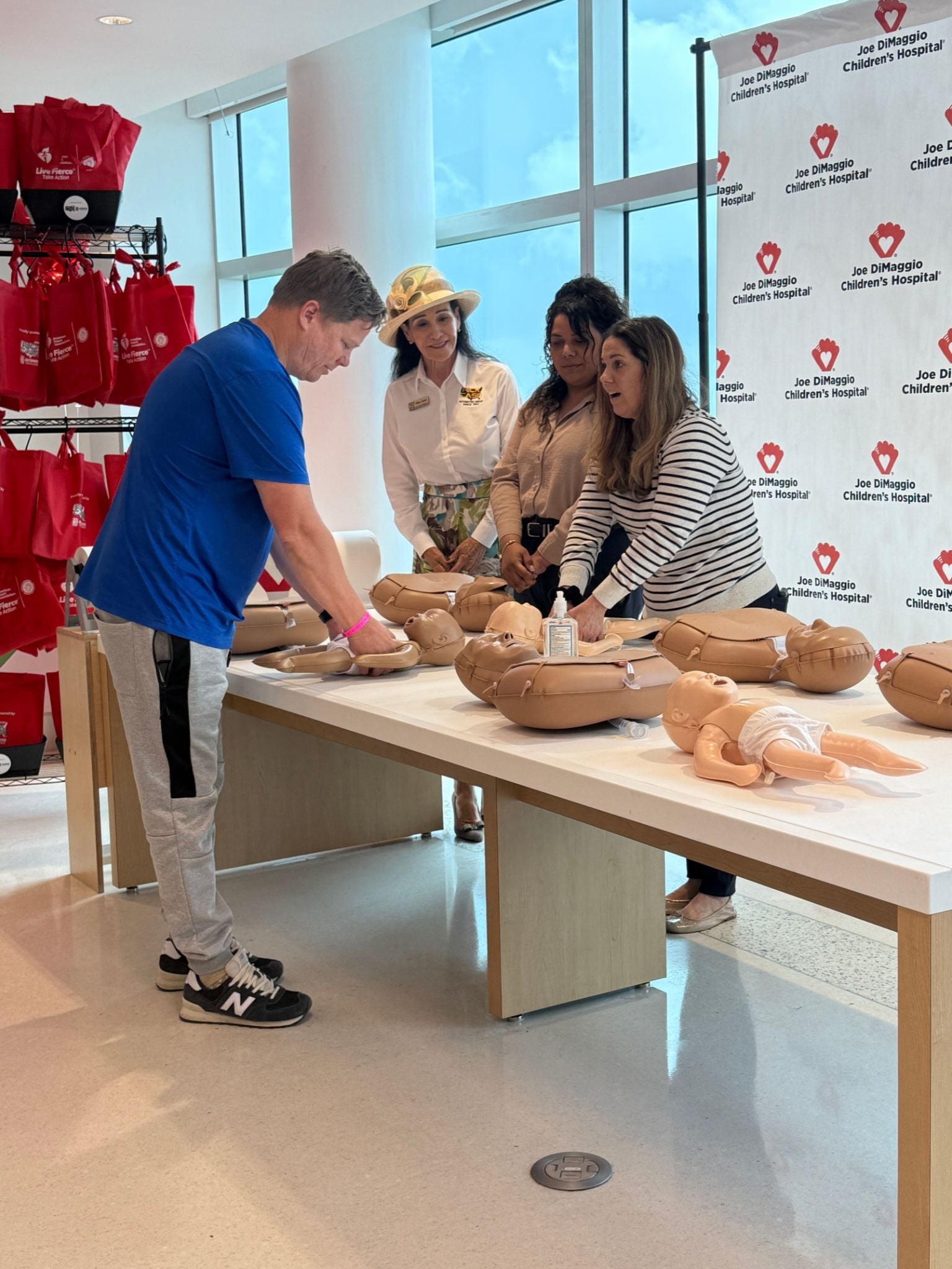 Rita%20Case%20CPR%20Kit%20Donation%20Demonstration.jpg