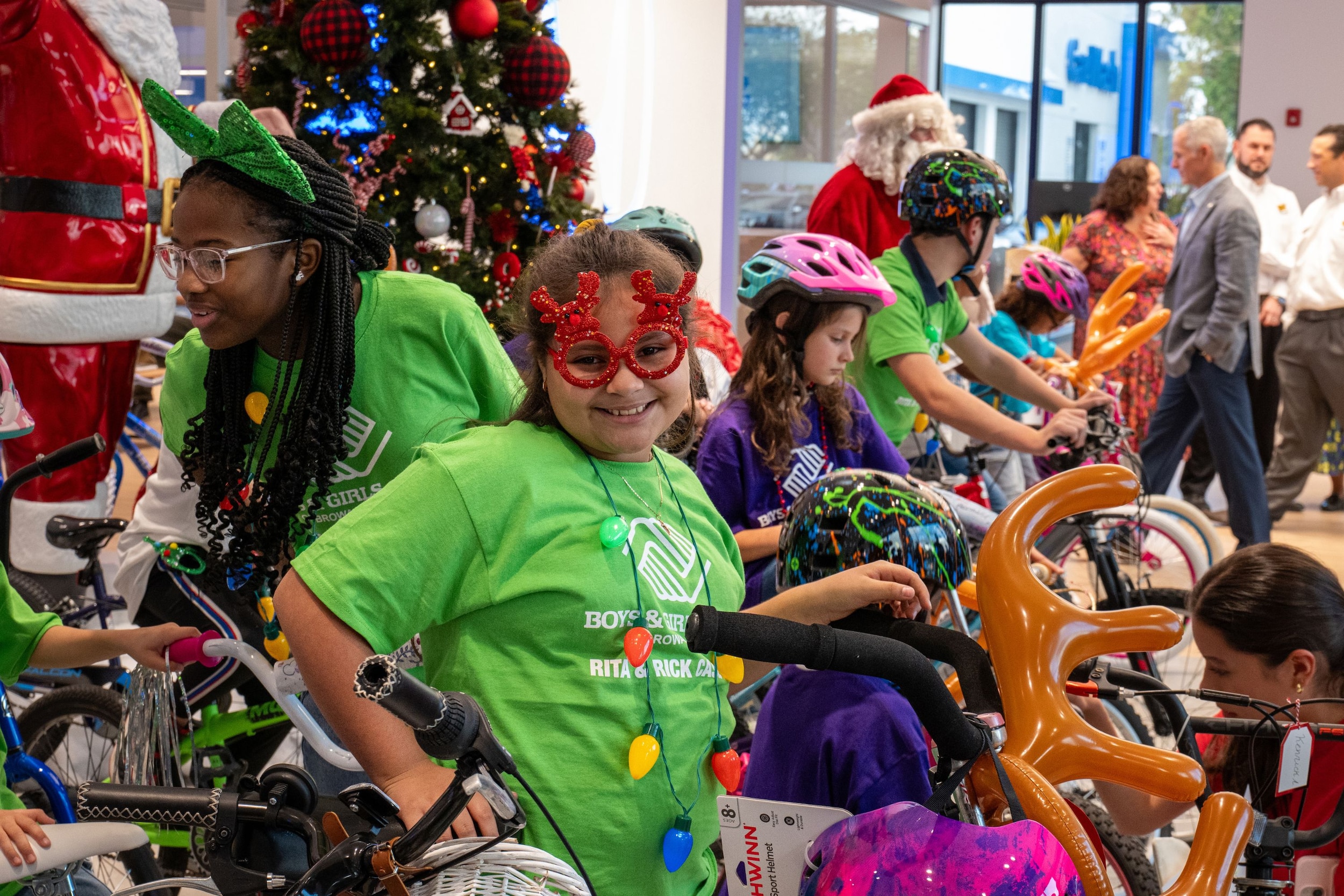 Photo%204%20-%20Isabella%20A.%20from%20Boys%20%26%20Girls%20Clubs%20of%20Broward%20County%20poses%20with%20her%20bike.jpg