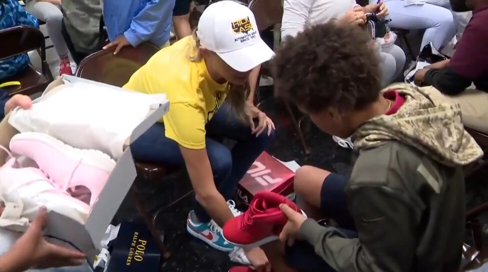 Students Recieve Brand New Shoes From Rick Case Automotive Group.jpg