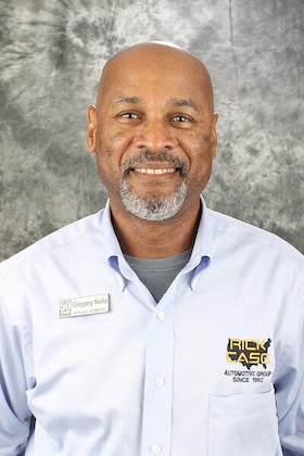 Staff member Gregory Neita from 3155fe530c06