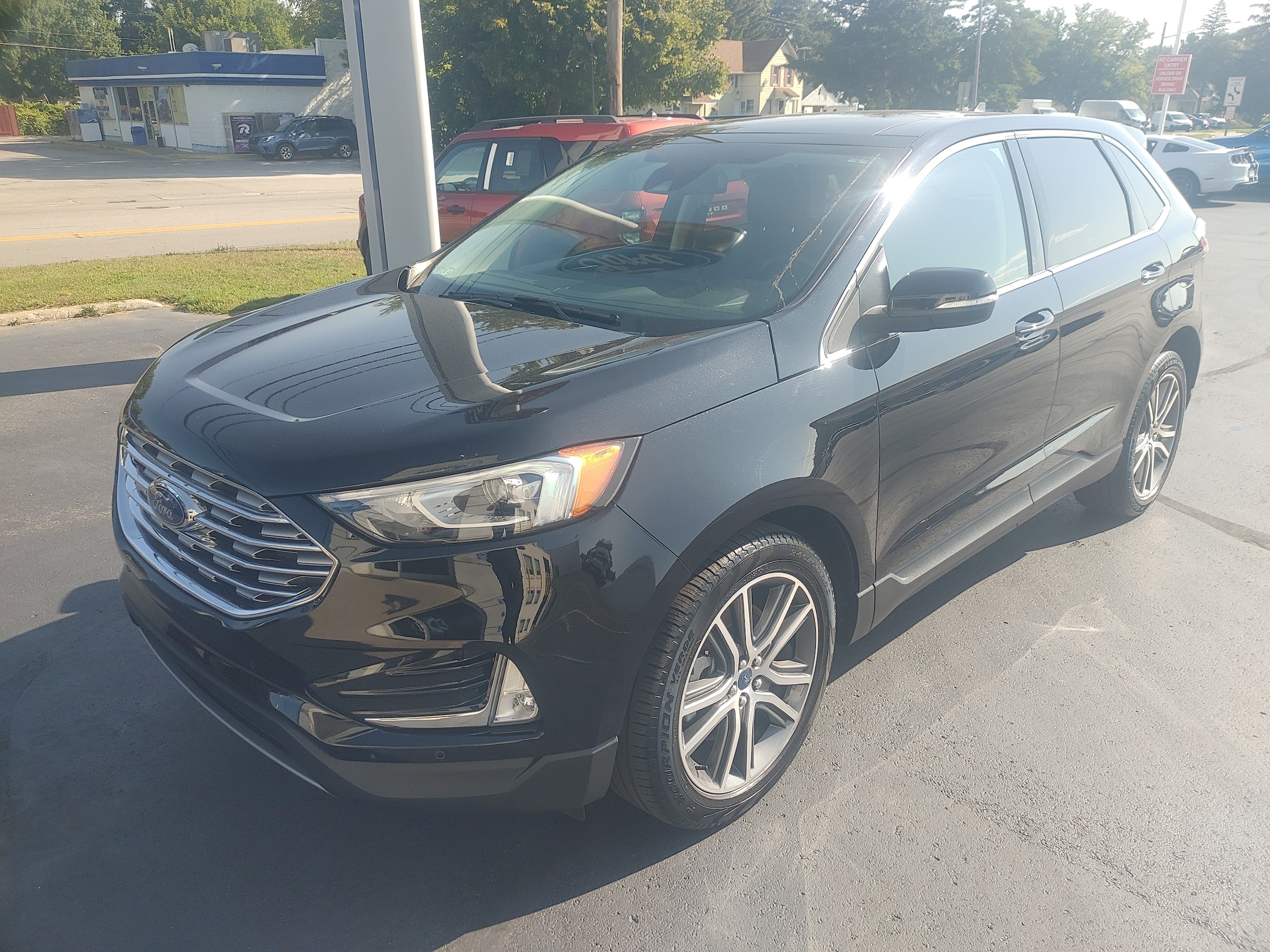 Used 2021 Ford Edge Titanium with VIN 2FMPK4K98MBA43285 for sale in Hemlock, MI