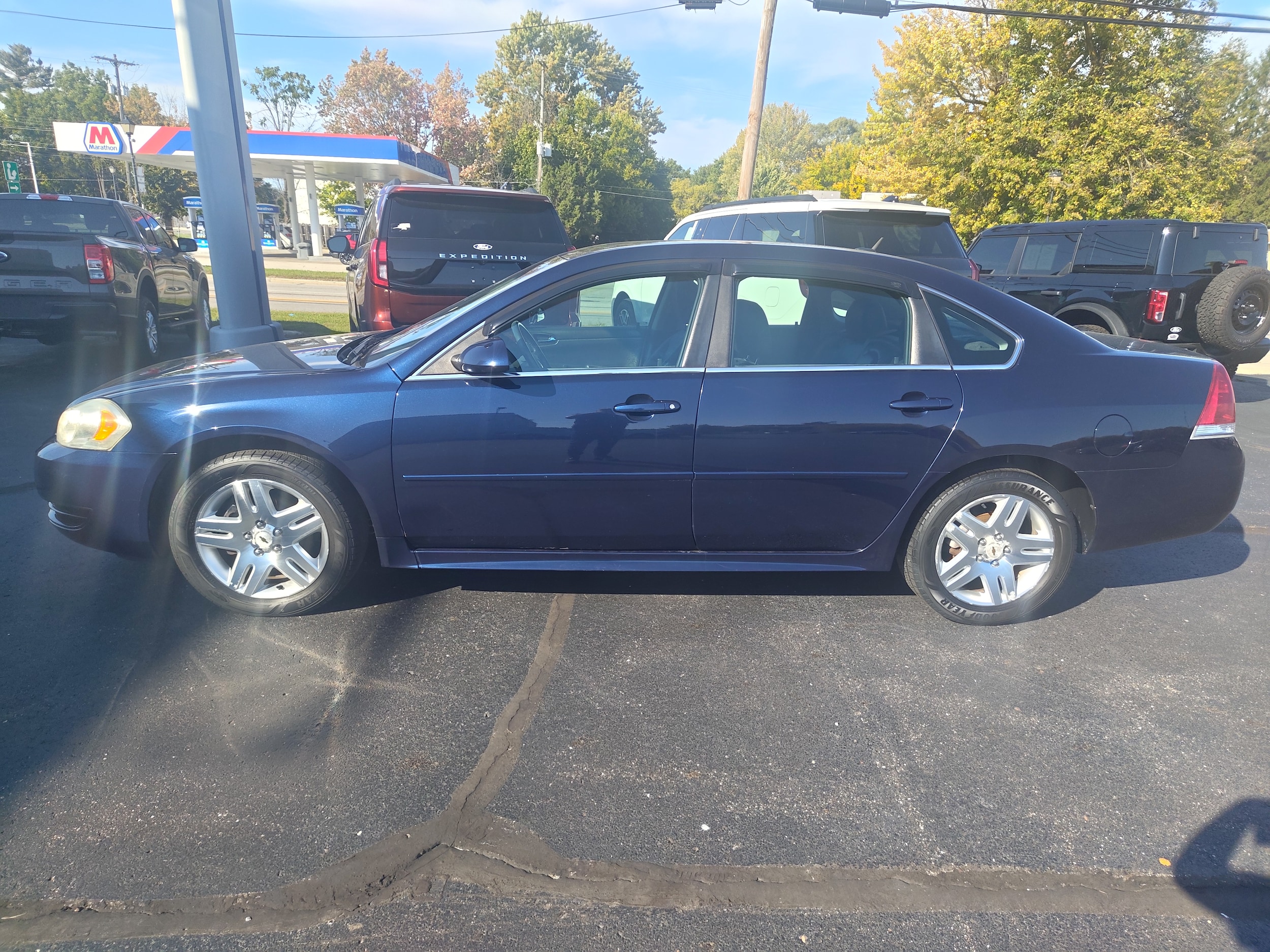 Used 2012 Chevrolet Impala LT with VIN 2G1WB5E37C1171334 for sale in Hemlock, MI