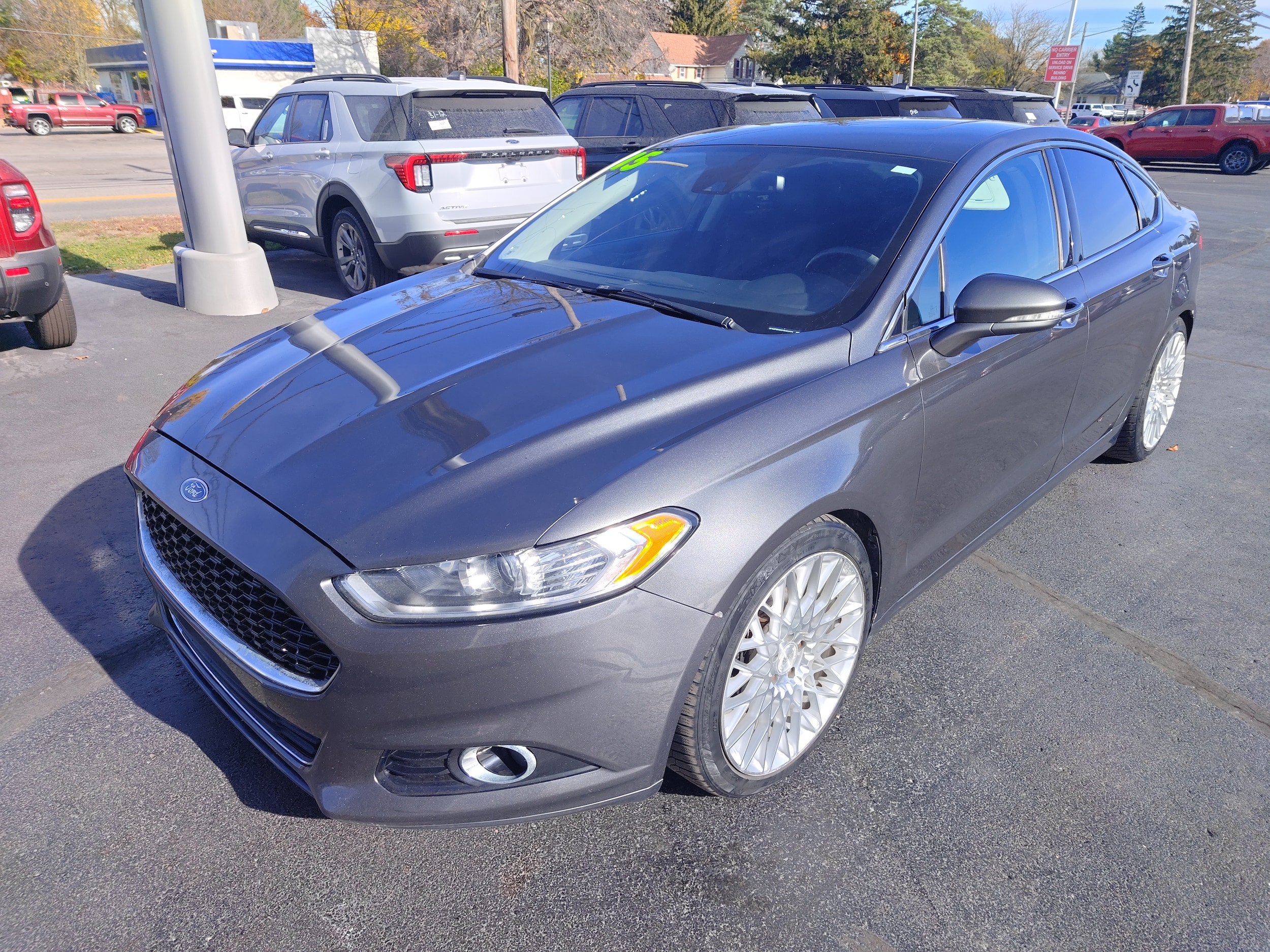 Used 2015 Ford Fusion Titanium with VIN 3FA6P0K9XFR303223 for sale in Hemlock, MI