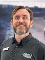 Staff member Chris Robinson from ID_171e444093d7