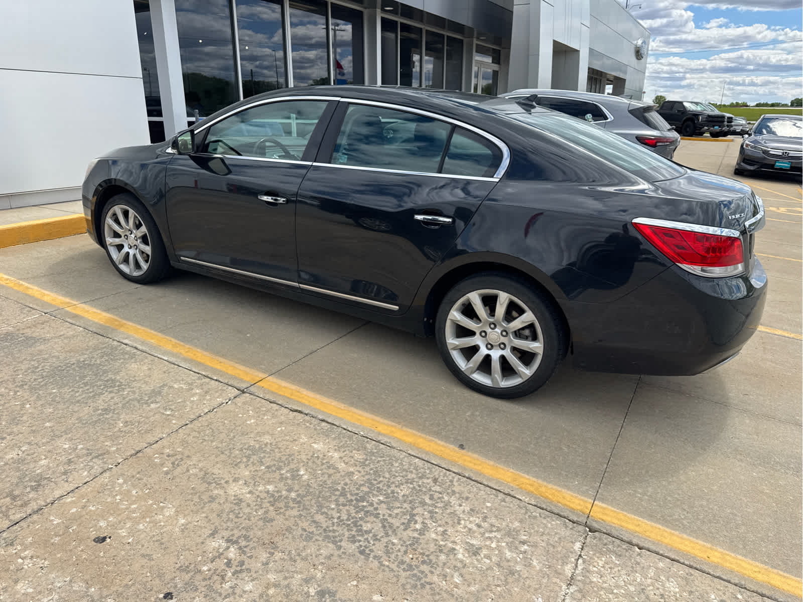 Used 2012 Buick LaCrosse Touring with VIN 1G4GJ5E31CF280827 for sale in Monticello, IL