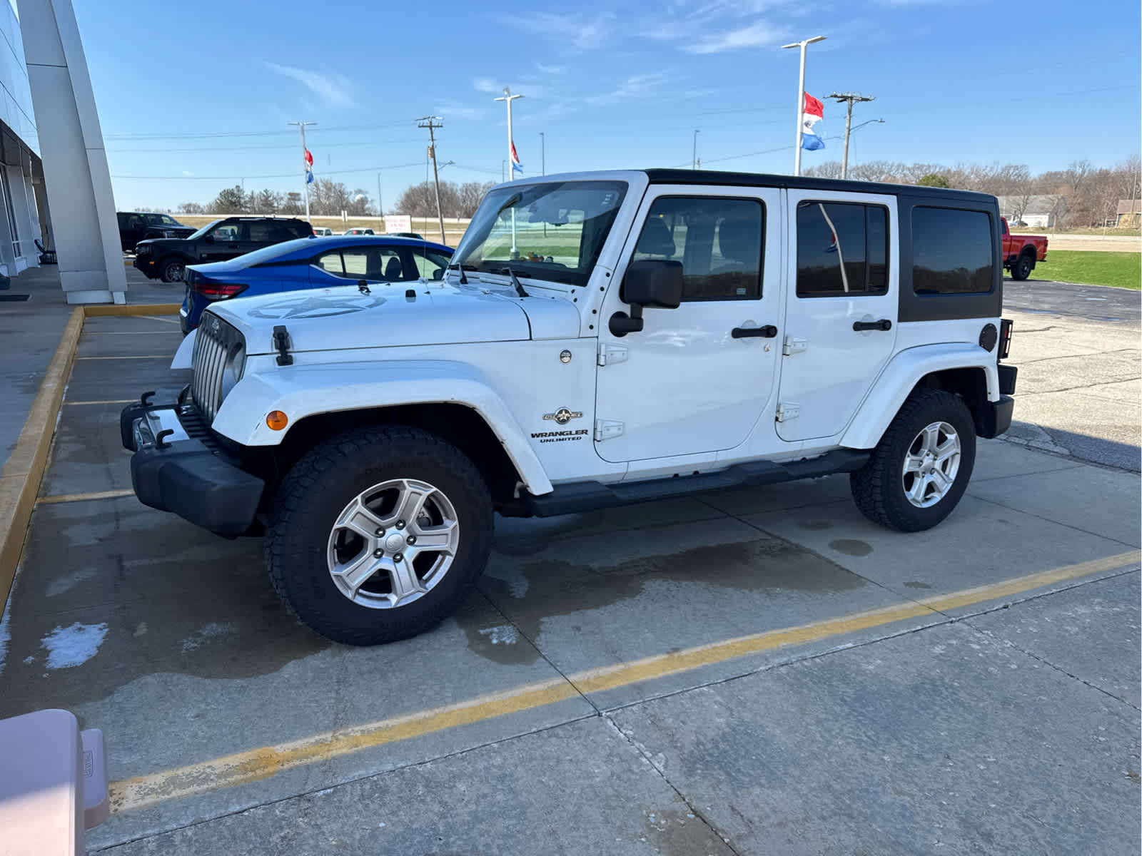 Used 2014 Jeep Wrangler Unlimited Sport with VIN 1C4BJWDG4EL196661 for sale in Monticello, IL