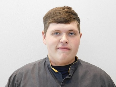 Staff member ALEX CROSBY from ID_dcfeee02f4a5