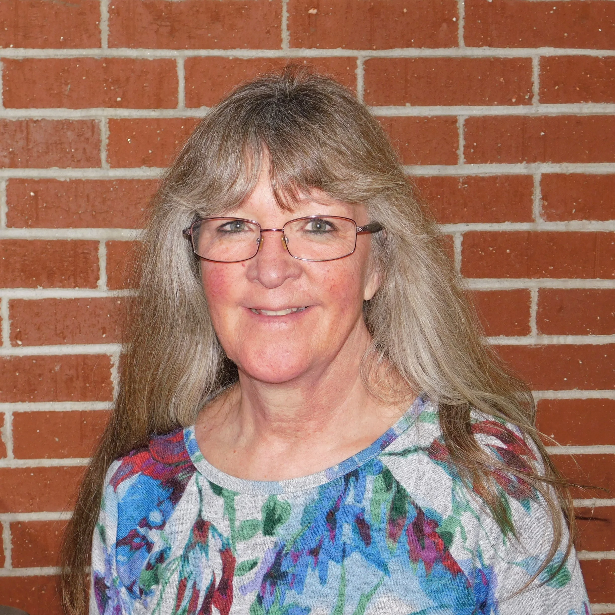 Staff member Karol Smith from c91f803b4764