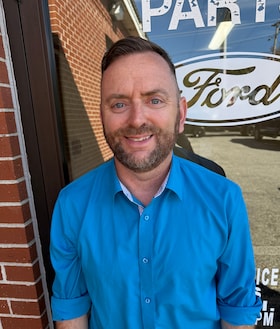 Staff member Justin Brawn from e7223fc6ec32