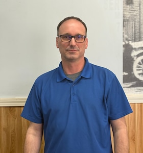 Staff member Greg Sessions from e7223fc6ec32