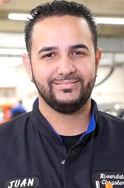 Staff member Juan Abreu from ID_b0018c079ace