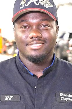 Staff member D'jay McFarlane from ID_cbede654d177